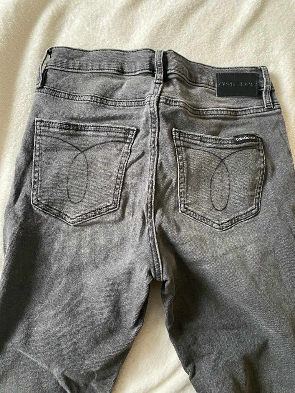 Calvin Klein Jeans Women’s High Rise Washed Gray Back-Pocket Jeans